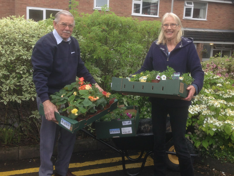 Customers receiving their Plant Sale delivery